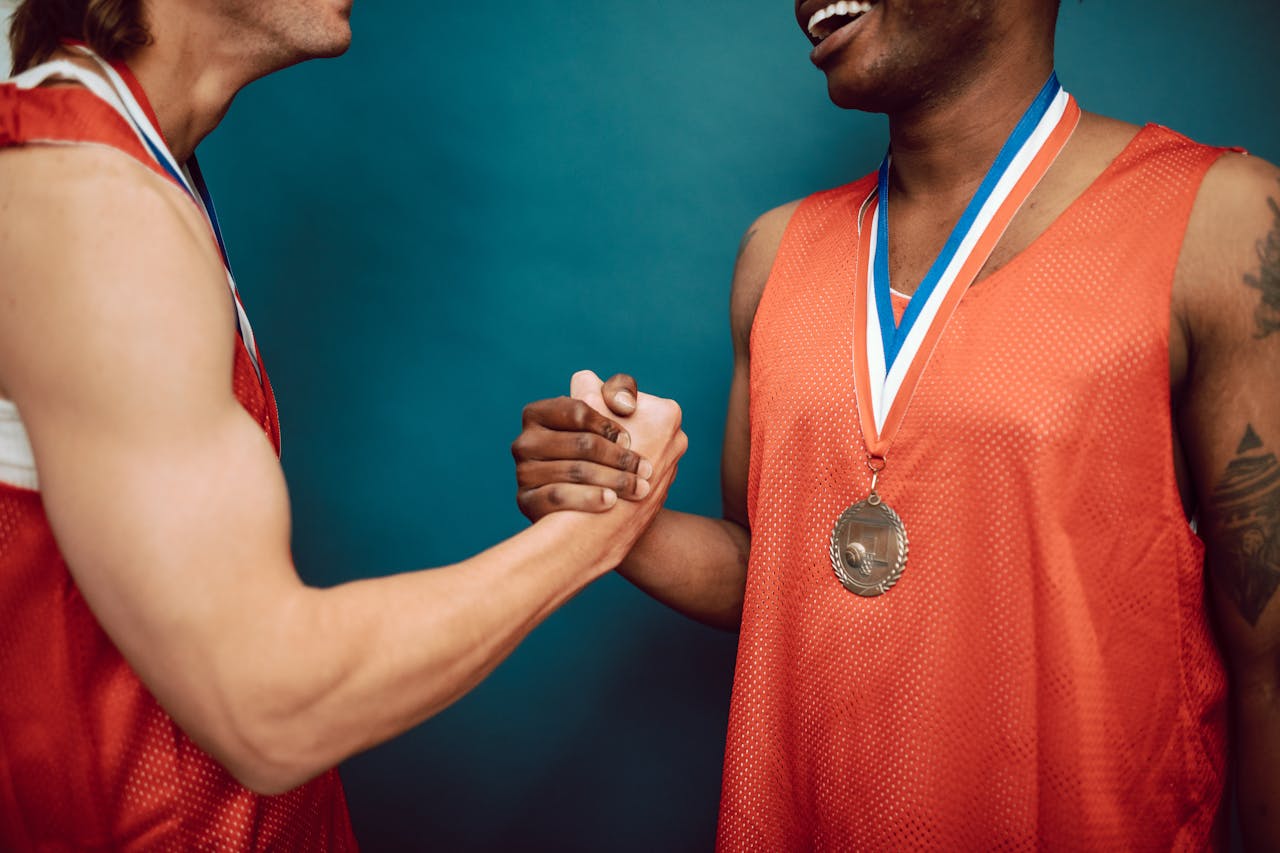 Basketball Players Holding Hands